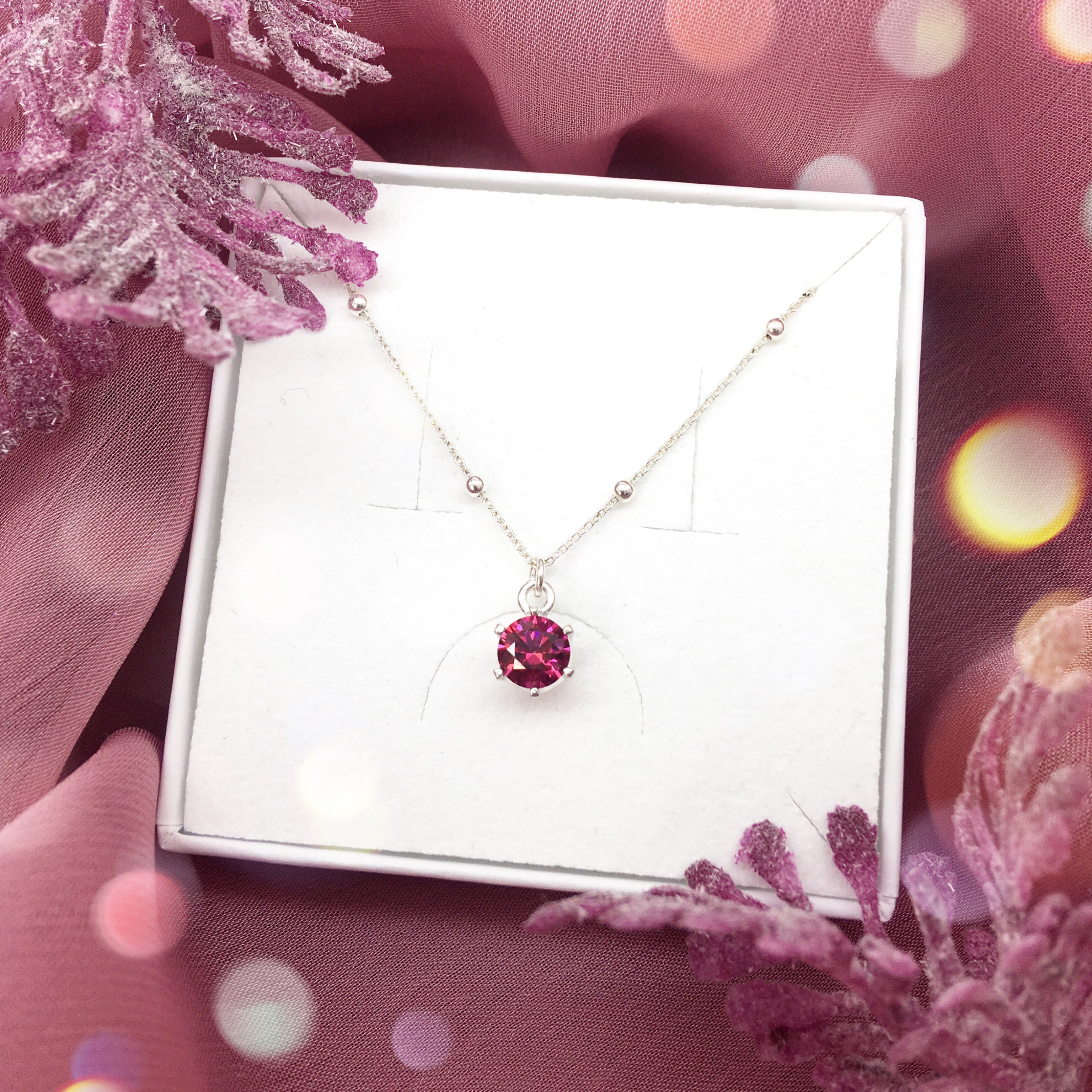 Colgante choker Swarovski con cristal rosa en colgante circular