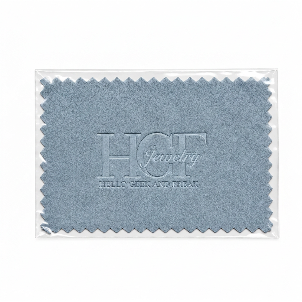 Pañito limpiajoyas azul, paño rectangular de microfibra con borde dentado