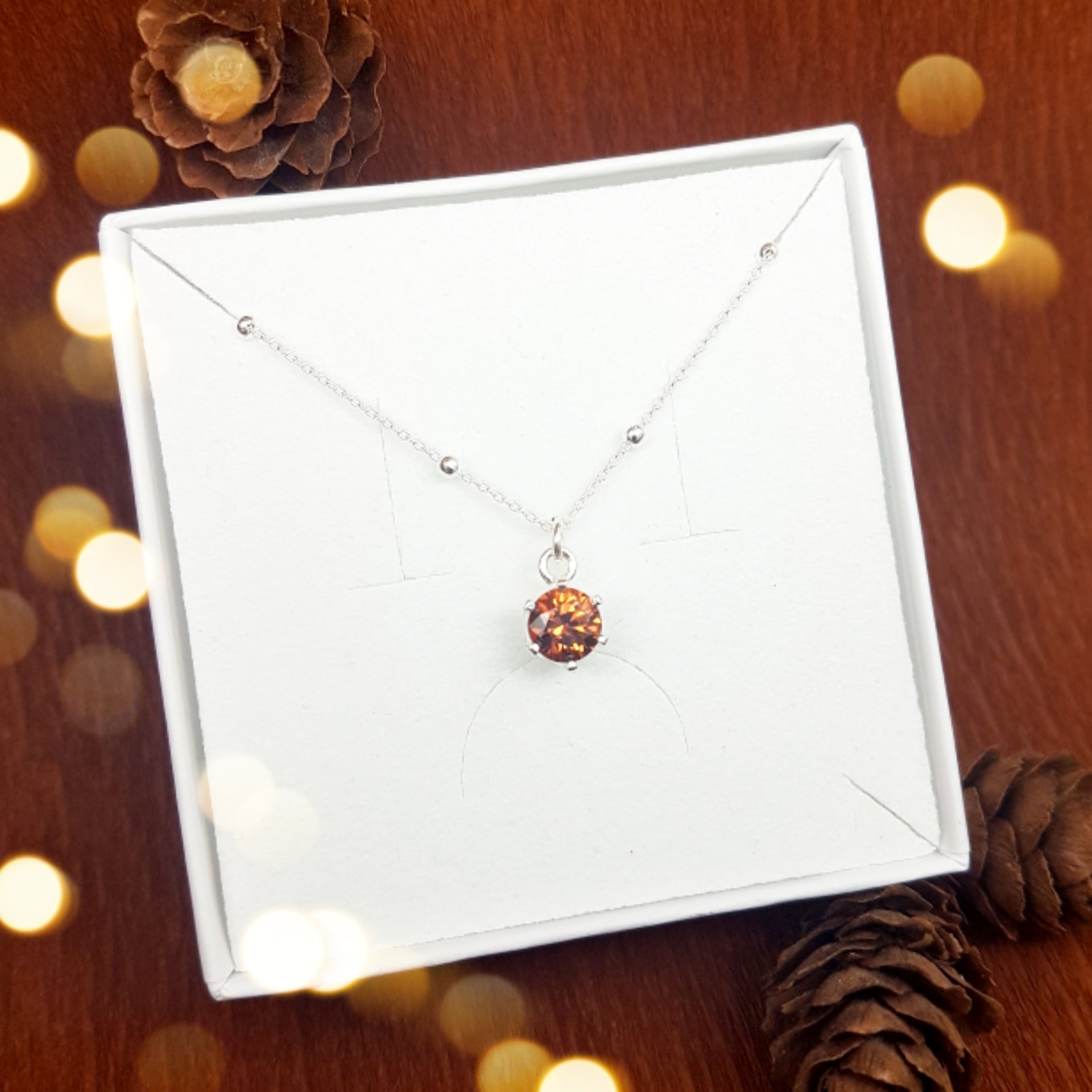 Colgante choker Swarovski con cristal naranja en colgante circular