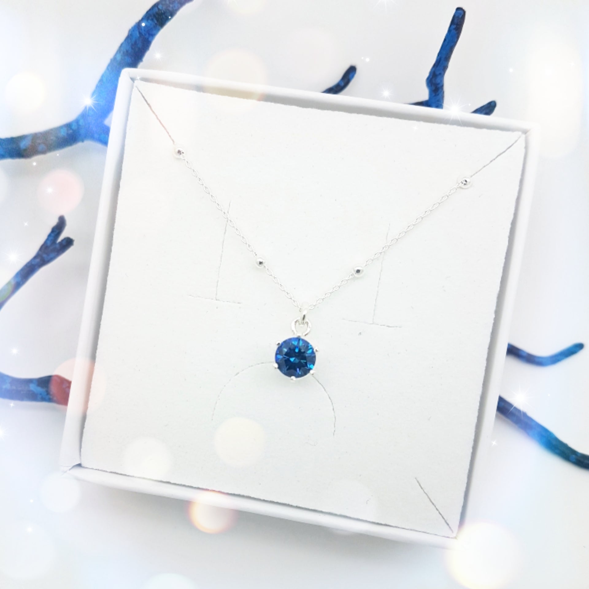 Colgante choker Swarovski con cristal azul en colgante circular