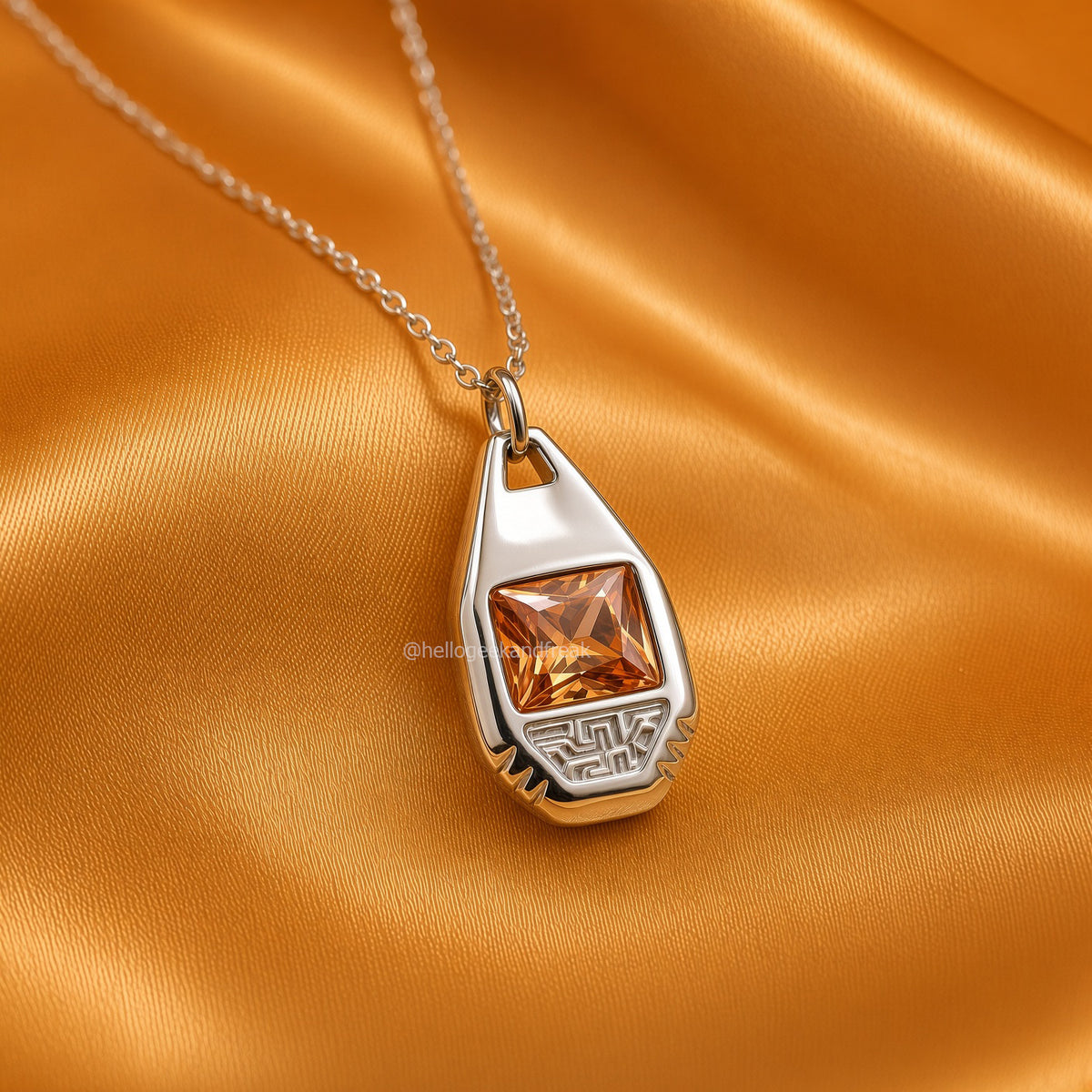 Colgante gota plateada con cadena y piedra naranja