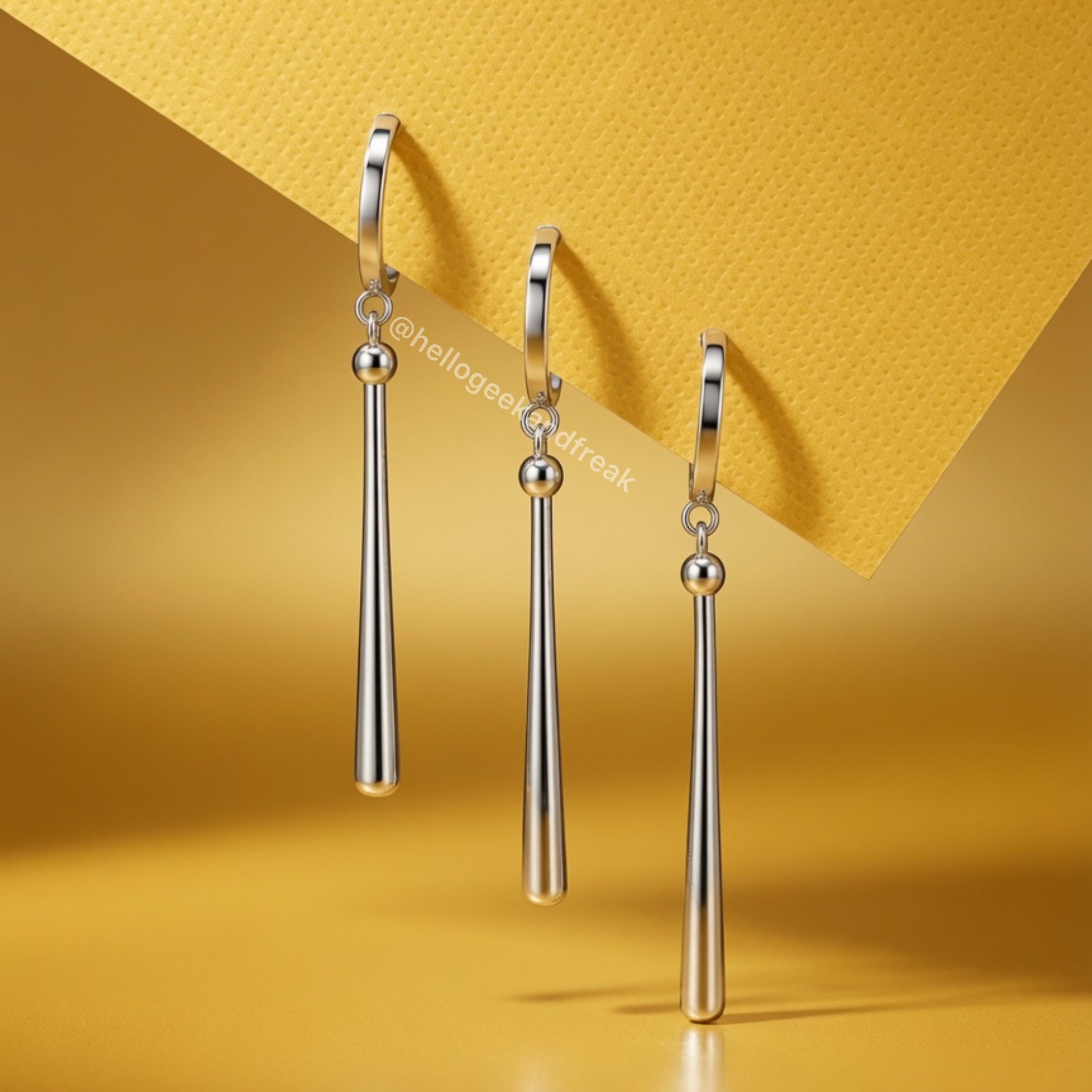 Pendientes largos plateados con barra vertical y bolita colgante